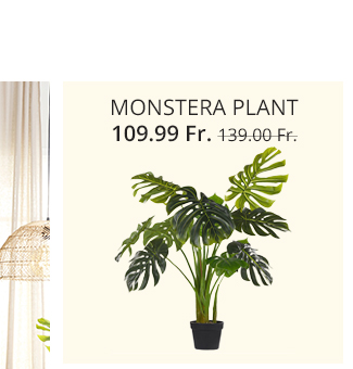 Grüne Kunstpflanze in Monstera-Form